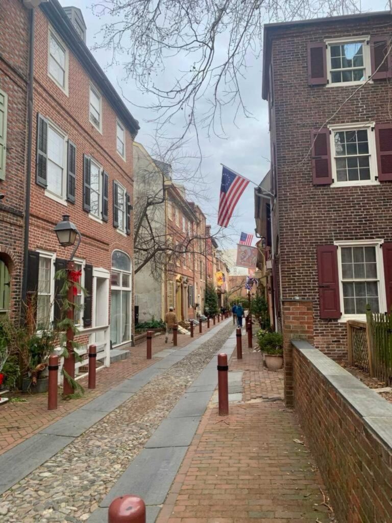 View of a small alleyway in Old City Philadelphia during Alice's exploration of the city's neighbourhoods